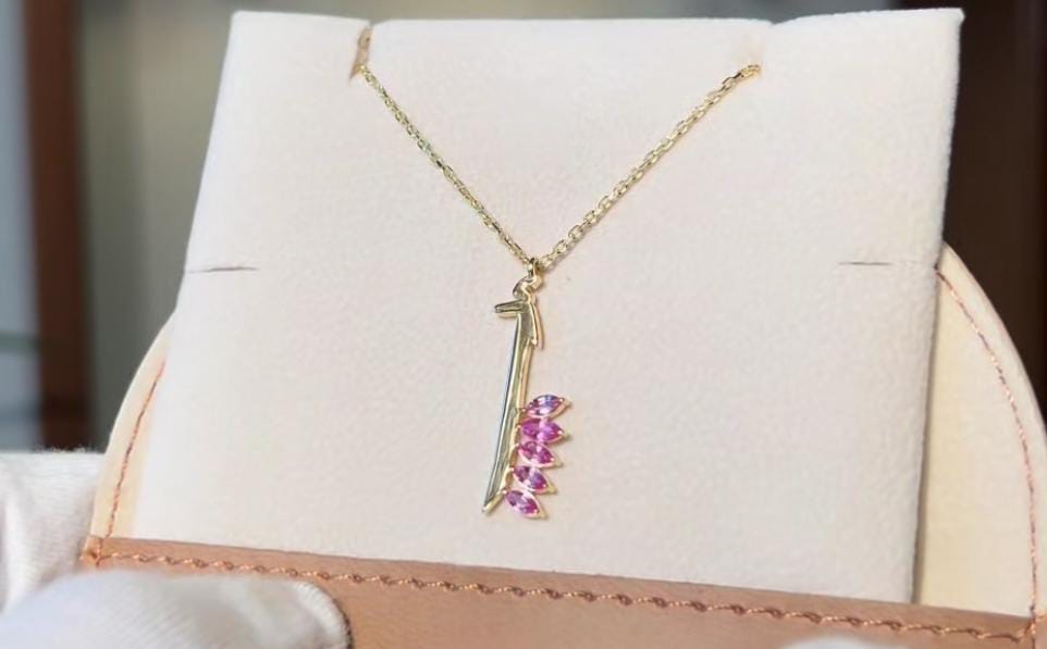 Faima Mohamed necklace letter أ with pink stones natural