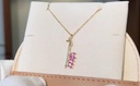 Faima Mohamed necklace letter أ with pink stones natural