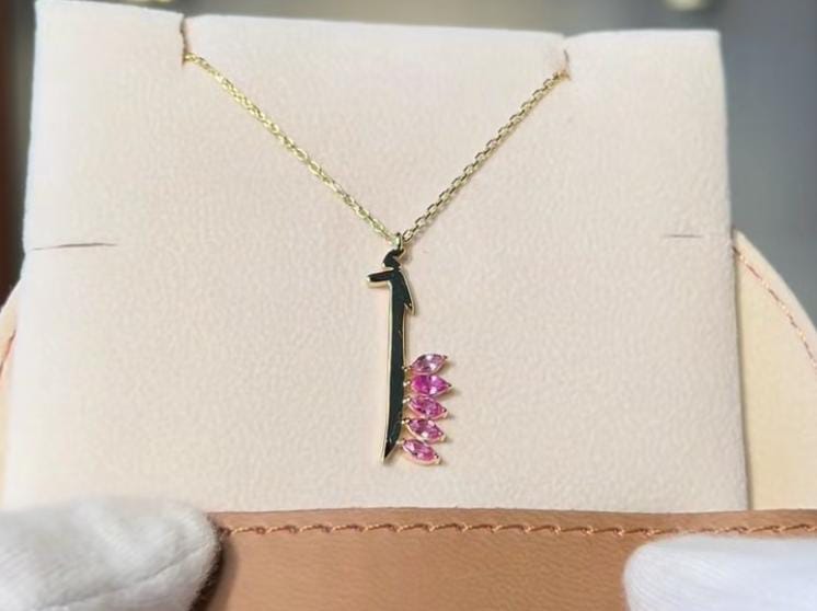 Faima Mohamed necklace letter أ with pink stones natural